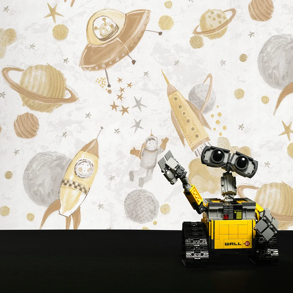 کاغذ دیواری کودک طرح کهکشان و فضانورد | کرم / طلایی کد 12105